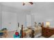 Comfortable bedroom with twin bed, ample storage, and neutral tones at 1 Plowlan Ct, Durham, NC 27707