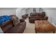 Cozy bonus room features plush seating and a neutral palette that provides a comfortable living space at 1 Plowlan Ct, Durham, NC 27707