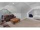 Spacious bonus room with a seating area, neutral carpet, and good ceiling height at 1 Plowlan Ct, Durham, NC 27707