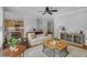 Open concept living room with hardwood floors, neutral walls and plenty of natural light at 1 Plowlan Ct, Durham, NC 27707