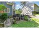 A cozy garden space with raised planters, perfect for growing vegetables and flowers at 102 Martins Point Pl, Cary, NC 27519