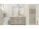 Well-lit bathroom featuring a tub, shower, neutral vanity, and stylish fixtures at 104 Corapeake Way, Apex, NC 27539