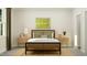 Neutral-toned bedroom with a woven bed frame, decorative pillows and side tables at 104 Corapeake Way, Apex, NC 27539