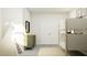 Well-lit ' bedroom featuring a bunk bed, play teepee, and modern dresser at 104 Corapeake Way, Apex, NC 27539