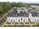 An aerial view of the neighborhood with various house colors and community landscaping at 104 Vallco Ln, Durham, NC 27713