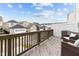 Cozy deck with outdoor seating area overlooking a neighborhood of modern homes at 104 Vallco Ln, Durham, NC 27713