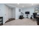 Finished basement with a home gym, office area, and doors for easy access at 104 Vallco Ln, Durham, NC 27713