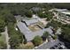 Aerial view of neighborhood church with parking lot, playground and green trees surrounding it at 106 Argyle Ct, Garner, NC 27529