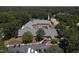 Aerial view of neighborhood church with parking lot, playground and green trees surrounding it at 106 Argyle Ct, Garner, NC 27529
