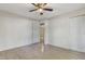 Bedroom with wood laminate floors, ceiling fan, and closet at 106 Argyle Ct, Garner, NC 27529