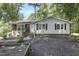 Charming one-story home featuring a brick and siding exterior with a welcoming front yard at 106 Argyle Ct, Garner, NC 27529