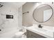 Stylish bathroom featuring sleek tile, a shower-tub combo and a modern vanity at 109 Riverbend Dr, Archer Lodge, NC 27527