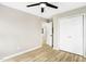 Bright bedroom featuring sleek flooring and closet space at 109 Riverbend Dr, Archer Lodge, NC 27527