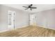 Bedroom featuring sleek flooring and modern ceiling fan at 109 Riverbend Dr, Archer Lodge, NC 27527