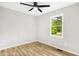 Bedroom featuring sleek flooring and a modern ceiling fan at 109 Riverbend Dr, Archer Lodge, NC 27527