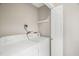Bright laundry room featuring a side-by-side washer and dryer for convenient chores at 109 Riverbend Dr, Archer Lodge, NC 27527