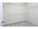 This empty closet space features multiple shelves at 1102 Birchbark Rd, Durham, NC 27705