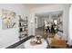 Cozy living room showcasing seamless open concept design with hardwood floors and neutral color palette at 1102 Birchbark Rd, Durham, NC 27705