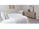 Inviting primary bedroom with soothing color palette, plush carpeting, and tasteful furnishings at 1102 Birchbark Rd, Durham, NC 27705