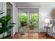 Cozy balcony with comfortable seating and a view of the surrounding trees at 1111 Sourwood Cir, Chapel Hill, NC 27517