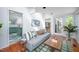 Cozy sitting area with a comfortable sofa and a view into the eat-in kitchen at 1111 Sourwood Cir, Chapel Hill, NC 27517