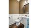 Elegant powder room features pedestal sink and decorative wall paneling at 113 Ruskin Dr, Chapel Hill, NC 27516