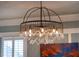 Close-up of a decorative chandelier with crystal embellishments, adding elegance to the home at 113 Ruskin Dr, Chapel Hill, NC 27516