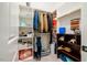 Organized closet space with built-in shelving, hanging racks, and storage solutions for various items at 113 Ruskin Dr, Chapel Hill, NC 27516