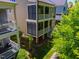 This exterior view showcases the home's multi-level porches, offering a unique outdoor living space at 113 Ruskin Dr, Chapel Hill, NC 27516