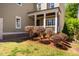 Inviting front porch with landscaping and a pathway leading to the entrance at 113 Ruskin Dr, Chapel Hill, NC 27516