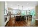 Spacious kitchen featuring a center island with bar stool seating and stainless steel appliances at 113 Ruskin Dr, Chapel Hill, NC 27516