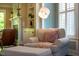 Bright and inviting living room with a comfortable armchair and a fireplace at 113 Ruskin Dr, Chapel Hill, NC 27516