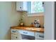 Bright office nook with built in desk, shelves, and window, perfect for working from home at 113 Ruskin Dr, Chapel Hill, NC 27516