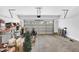 Spacious garage with overhead storage, capable of fitting a car and storage, providing ample space at 11549 Helmond Way # 107, Raleigh, NC 27617