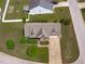 Aerial view of a home with lush landscaping, a driveway, and a manicured lawn at 124 Willa Chase Ct, Benson, NC 27504