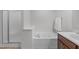 Bathroom featuring a soaking tub, a separate shower and a vanity at 124 Willa Chase Ct, Benson, NC 27504