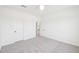 The room features a bright empty bedroom with neutral carpet and a blank canvas ready for personal touch at 1410 Malcus Ct # 55, Fuquay Varina, NC 27526