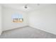 The room features a bright bedroom with a large window and neutral carpet offering a comfortable space at 1410 Malcus Ct # 55, Fuquay Varina, NC 27526