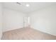 The room features a bright empty bedroom with neutral carpet and a blank canvas ready for personal touch at 1410 Malcus Ct # 55, Fuquay Varina, NC 27526