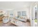 Well-lit living room with comfortable seating, stylish decor, and a seamless flow into the dining area at 1410 Malcus Ct # 55, Fuquay Varina, NC 27526