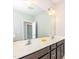 Bathroom features a double sink vanity and large mirror at 149 Wards Ridge Dr, Cary, NC 27513