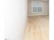 Bright bedroom features neutral carpet and a window for natural light at 149 Wards Ridge Dr, Cary, NC 27513