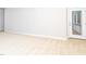 Neutral bedroom with door to the outside porch and tan carpet at 149 Wards Ridge Dr, Cary, NC 27513