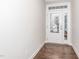 Bright entry foyer with a glass front door and side windows, offering a glimpse of the outdoors and natural light at 149 Wards Ridge Dr, Cary, NC 27513