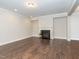 Spacious living room features hardwood flooring, recessed lighting and a fireplace for cozy evenings at 149 Wards Ridge Dr, Cary, NC 27513