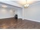 Spacious living room with hardwood floors, fireplace, and elegant chandelier at 149 Wards Ridge Dr, Cary, NC 27513