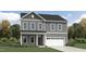 Two-story home with gray siding, white trim, stone accents, and a two-car garage on a sunny day at 1548 Bright Coral Trl, Wendell, NC 27591