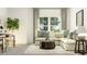 Comfortable living room featuring a sectional sofa, natural light, and stylish decor at 1548 Bright Coral Trl, Wendell, NC 27591