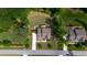 Expansive backyard featuring a wooden deck and a cozy outdoor fire pit area at 1820 Yates Wheel Way, Raleigh, NC 27606