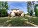Spacious backyard featuring a wooden deck and well-maintained lawn at 1820 Yates Wheel Way, Raleigh, NC 27606
